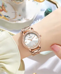 Detail of rose gold stainless steel watch with zircon bezel and flowing star diamonds
