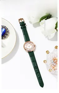 Elegant emerald green leather watch for women with rose gold case and crystal texture dial