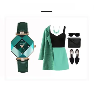 Detail view of octagon rose gold watch with dark green leather strap and style pairing guide