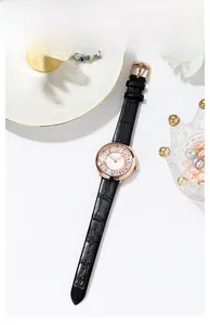 Detail of elegant women's watch featuring a rose gold case and starry diamond dial