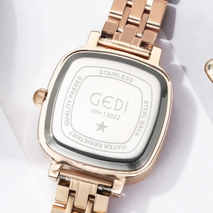 GEDI rose gold square quartz watch showing the stainless steel back with logo engraving