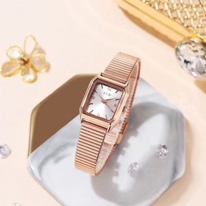 Elegant rose gold square quartz watch for women with Roman numerals on marble tray