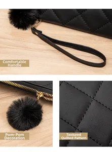 Detail of black quilted PU leather wallet with gold hardware and faux fur pompom charm