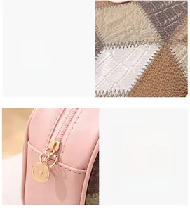 Close-up of pink textured faux leather material and golden round zipper on stylish handbag