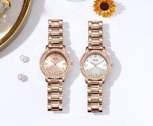 Close-up of luxury rose gold quartz watches with diamond accents and floating dial crystals