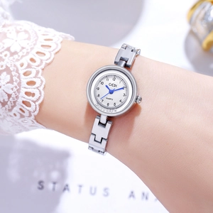 Elegant silver GEDI women's watch with rhinestone bezel and blue hands on white dial