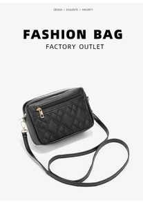 Macro detail of black quilted diamond texture and golden hardware on the shoulder bag