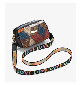 Detail of checkered retro crossbody bag with colorful LOVE wide strap and gold hardware