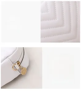 Gros plan sur la texture matelassée blanche et le zip en métal doré du sac