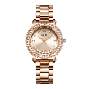 Luxury rose gold women watch with crystal bezel and floating rhinestones on dial