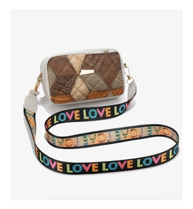 Detail of geometric quilted patchwork handbag with colorful LOVE letter wide strap