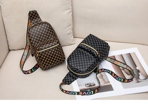 Detail of crossbody chest bags featuring geometric pattern and LOVE print colorful straps