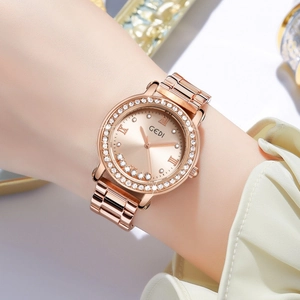Elegant rose gold women's watch featuring a sparkling rhinestone bezel and metal strap