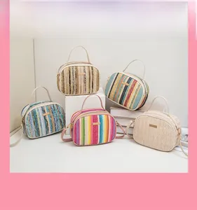 Selection of five bohemian woven handbags in colorful stripes and solid pastel shades