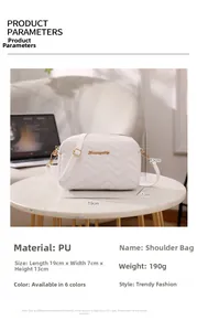 White quilted PU leather crossbody bag dimensions 19x7x13cm shown on marble table