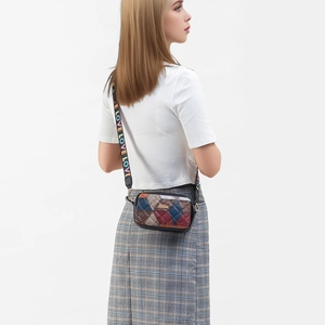 Quilted patchwork crossbody bag with colorful blocks and LOVE wide shoulder strap