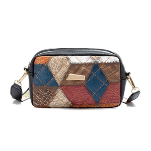 Vintage patchwork crossbody camera bag with plaid prints and textured faux leather panels