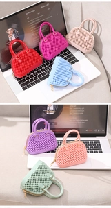 Close-up of pearl texture silicone shell bags with gold zippers in macaron colors