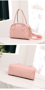 Detail of pink quilted handbag showing rhombus stitching and removable shoulder strap
