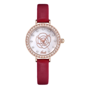Elegant women's watch with red leather strap, rhinestone bezel, and rose floral dial