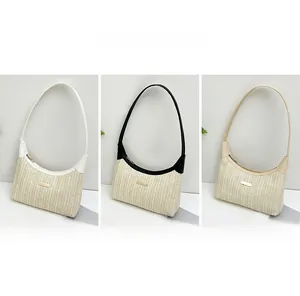Detailed comparison of three straw hobo bags in white, black, and beige with leather trim