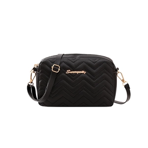 Classic black wave quilted crossbody camera bag with gold logo and adjustable strap