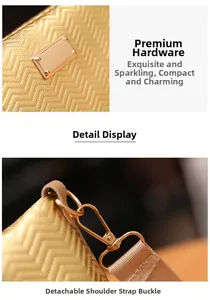 Detail of golden wave-pattern handbag showing metal hardware and detachable strap clasp