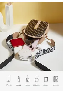Internal view of crossbody phone bag showing space for phone, lipstick and cosmetics