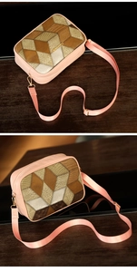 Detail of pink crossbody camera bag with 3D geometric patchwork and snake texture