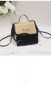 Detail of straw handbag with black leather trim and size comparison next to smartphone
