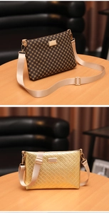 Detail of two crossbody bags in dark brown geometric print and metallic gold woven texture
