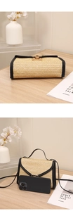 Size comparison of straw square bag with phone showing scale and woven texture detail