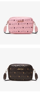Detail view of quilted cross-body bags in pink and brown with Luck For You print