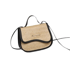 Mini beige straw handbag with black leather trim and gold logo detail on white background