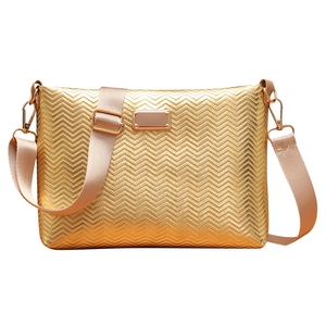 Gold wavy embossed envelope crossbody bag with adjustable beige strap on white background