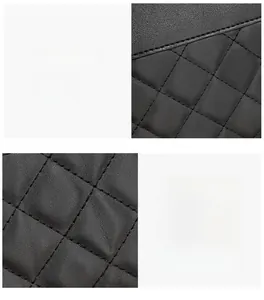 Close-up of tight stitching and premium quilted leather texture on a black bucket bag