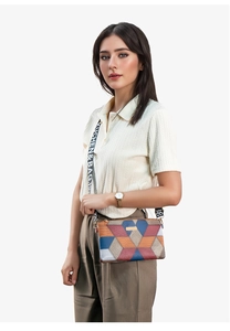 Detail of geometric patchwork crossbody bag with textured leather and printed wide strap