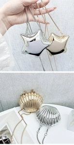 Mini metallic star and shell chain bags in gold and silver finishes on a grey background