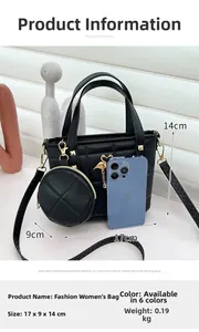 Quilted black bucket bag with flamingo charm and coin pouch detailing the 17x9x14cm size