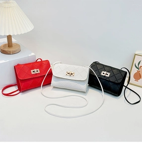Three elegant quilted crossbody bags in red, white and black colors with gold locks