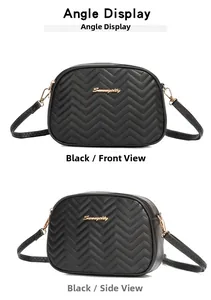 Front and side view of black quilted crossbody bag with golden hardware and V-shaped embroidery