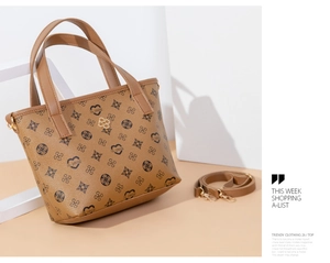 Detail view of mini brown floral tote bag with textured PU leather and golden petal logo