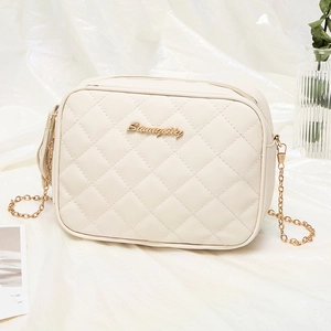 Elegant creamy white quilted crossbody bag with golden chain strap and metal logo accent
