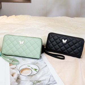 Portefeuille matelassé en peluche avec fermoir papillon en vert menthe et noir