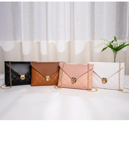 Quilted chain cross-body bags in black, brown, pink, and white with golden hardware