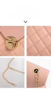 Detail display of pink quilted faux leather texture with golden twist lock and chain