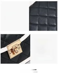 Macro detail of quilted black leather handbag with white trim and gold turn-lock closure