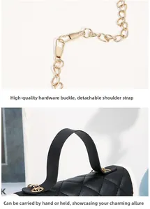 Close-up of premium gold hardware buckle and detachable chain strap on black quilted bag