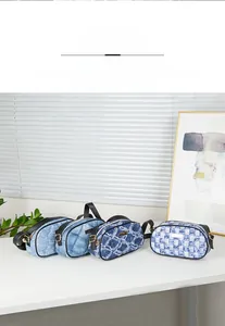 Mini denim crossbody bags in four prints with gold zipper and adjustable black straps