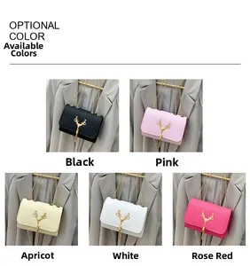 Detail view of mini chain crossbody bags with deer tassel clasp in five multiple colors